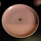 Top view of the Old Rose Ganga Dinner Plate, a pink and 24-karat gold ceramic plate you can buy online at Sukham Home, a sustainable furniture, gardening and home decor store in Kolkata, India