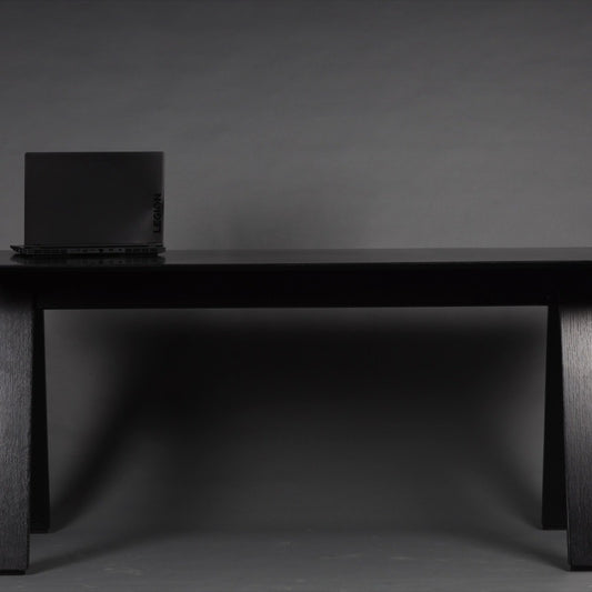 In Ash Charcoal, the Oslo Desk, a wooden office table you can buy online at Sukham Home, a sustainable furniture, kitchen & dining and home decor store in Kolkata, India