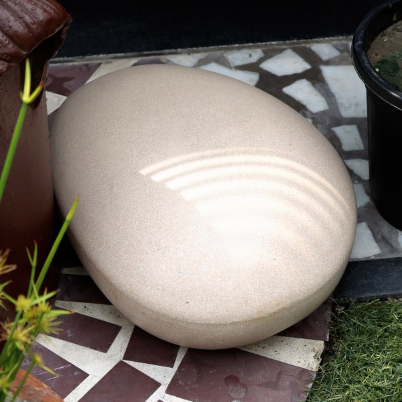 Small Cream Stone Pebble, a rock-shaped stone finish plastic planter that looks like granite available at Sukham Home, a sustainable furniture, gardening and home decor store in Kolkata, India