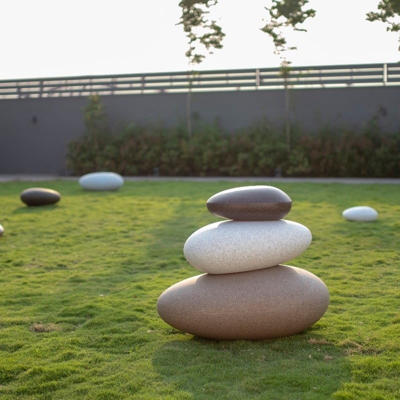 All three sizes, the Sand Stone, White Stone and Brown Stone Pebble, a rock-shaped stone finish plastic planter that looks like granite available at Sukham Home, a sustainable furniture, gardening and home decor store in Kolkata, India