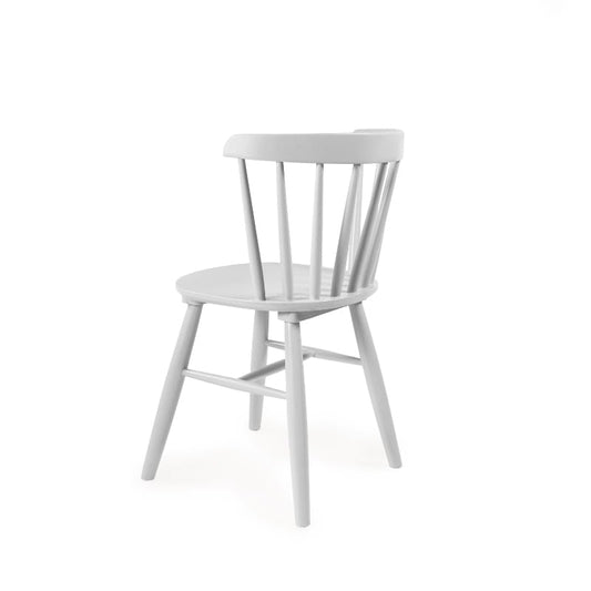 Against a white background, back view of the Oak White Perch Chair, a solid wood Windsor dining seat you can buy online at Sukham Home, a sustainable furniture and home decor store in Kolkata, India