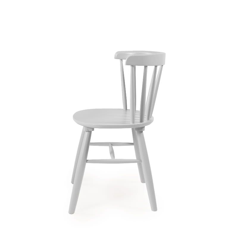 Against a white background, side view of the Oak White Perch Chair, a solid wood Windsor dining seat you can buy online at Sukham Home, a sustainable furniture and home decor store in Kolkata, India