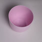 Top view of the pink Verona, a round colourful indoor planter made from plastic that you can buy online at Sukham Home, a sustainable furniture, gardening and home decor store in Kolkata, India