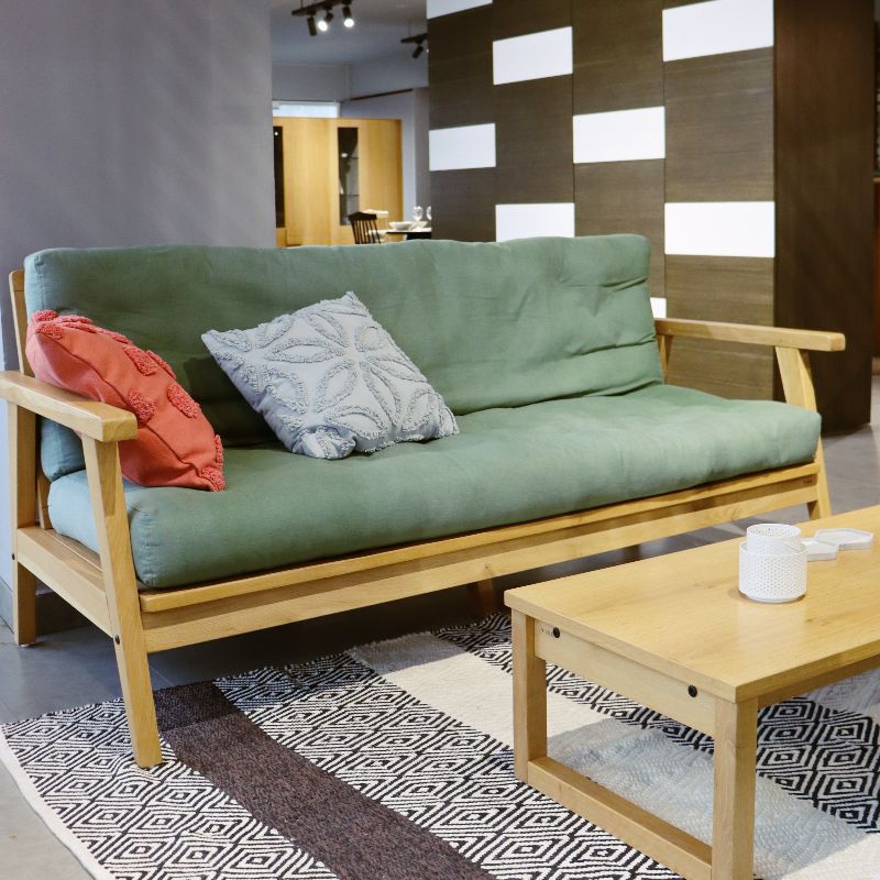 Using the Lush Fabric, the Oak Natural Poise Sofa, a wooden cushioned midcentury sofa you can buy online at Sukham Home, a sustainable furniture, kitchen & dining and home decor store in Kolkata, India