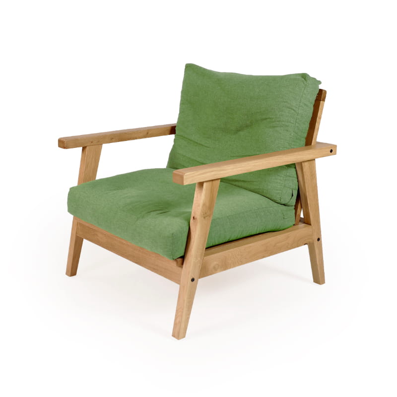 Against a white background, using the Lush green fabric the Oak Natural Poise Armchair, a wooden cushioned midcentury seat you can buy online at Sukham Home, a sustainable furniture, kitchen & dining and home decor store in Kolkata, India