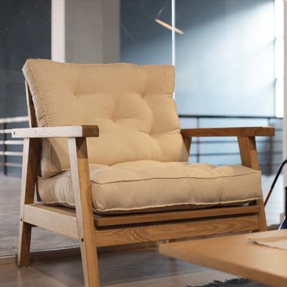 Using the Umber fabric, the Oak Natural Poise Armchair, a wooden cushioned midcentury seat you can buy online at Sukham Home, a sustainable furniture, kitchen & dining and home decor store in Kolkata, India