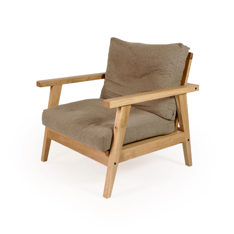 Against a white background, with Smoke fabric the Oak Natural Poise Armchair, a wooden cushioned midcentury seat you can buy online at Sukham Home, a sustainable furniture, kitchen & dining and home decor store in Kolkata, India