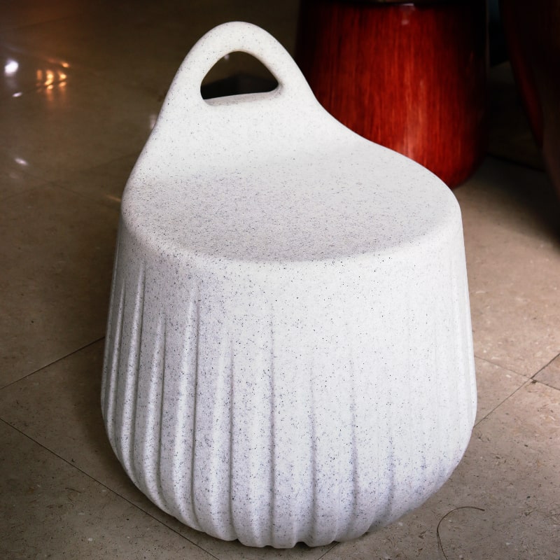 Top view of White Stone Rio Stool, a stone finish plastic outdoor furniture seat you can buy online at Sukham Home, a sustainable furniture, kitchen & dining and home decor store in Kolkata, India