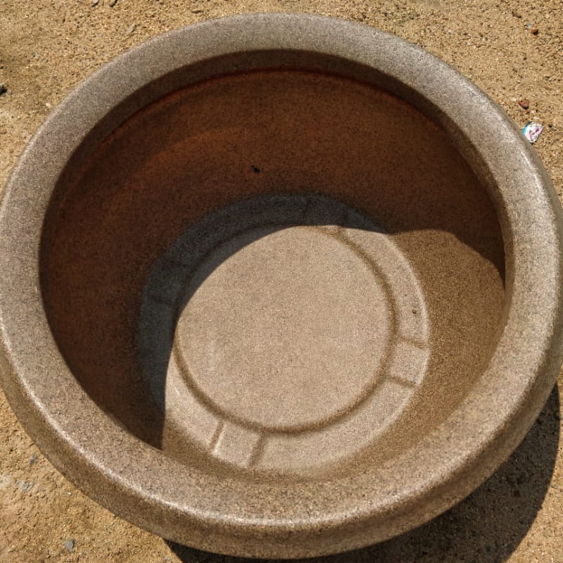 Top view of the Sand Stone Lotus Bowl, a round stone finish plastic planter that looks like granite available at Sukham Home, a sustainable furniture, gardening and home decor store in Kolkata, India