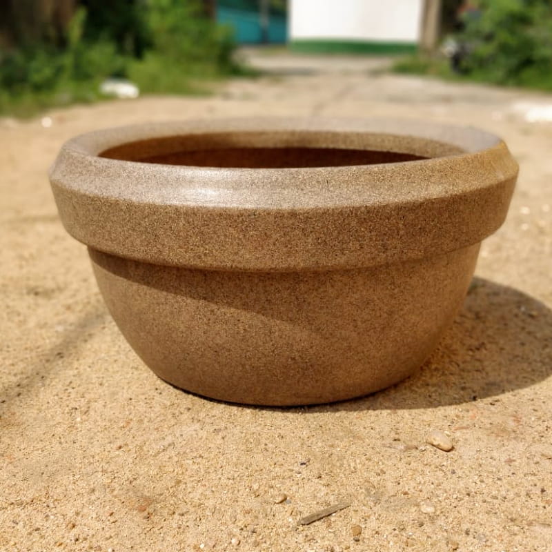 Side view of the Sand Stone Lotus Bowl, a round stone finish plastic planter that looks like granite available at Sukham Home, a sustainable furniture, gardening and home decor store in Kolkata, India