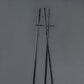 Against a grey background, the Ash Charcoal Scarecrow, a wooden entryway designer quirky coat hanger you can buy online at Sukham Home, a sustainable furniture, kitchen & dining and home decor store in Kolkata, India