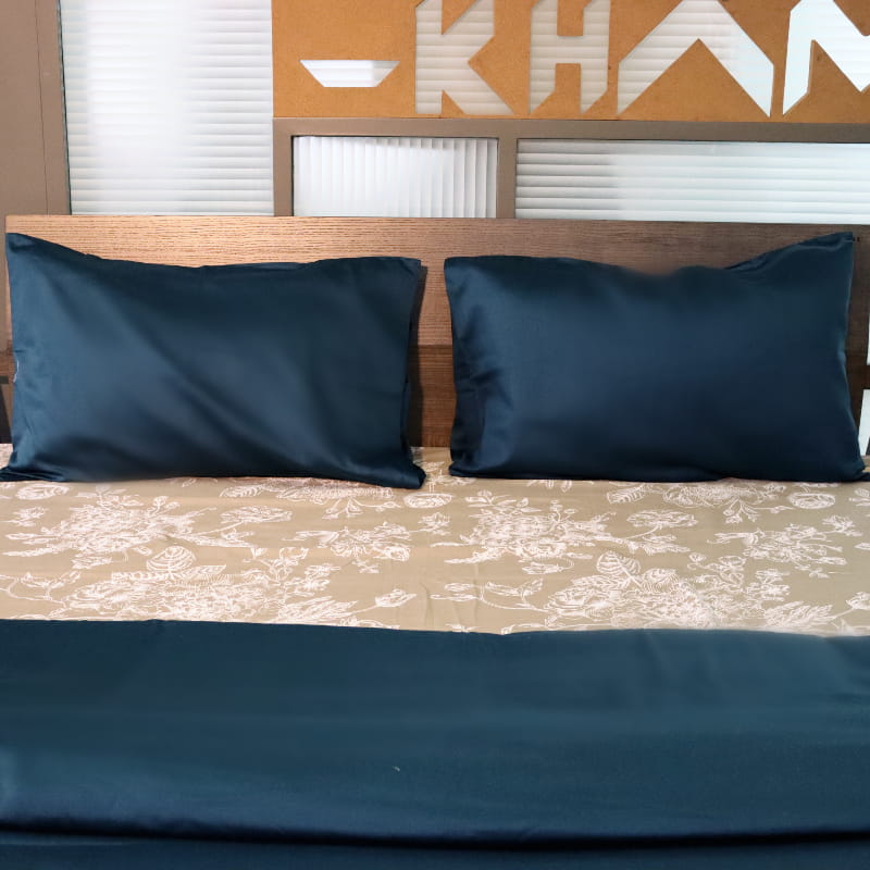 Both pillow covers and the duvet of the Teal Solid Egyptian Cotton Duvet Cover, a plain green king size duvet cover you can buy online at Sukham Home, a sustainable furniture, gardening and home decor store in Kolkata, India