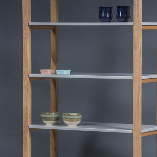 In an Oak Natural finish, the Tier Shelf, a multipurpose wooden open shelf storage solution and cabinet you can buy online at Sukham Home, a sustainable furniture, kitchen & dining and home decor store in Kolkata, India