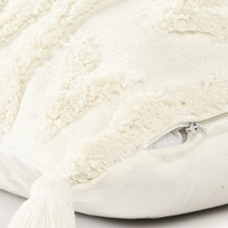 Close up of the zipper of the White Diamond Tufted Cushion, a square ivory accent pillow available at Sukham Home, a sustainable furniture, kitchen & dining and home decor store in Kolkata, India