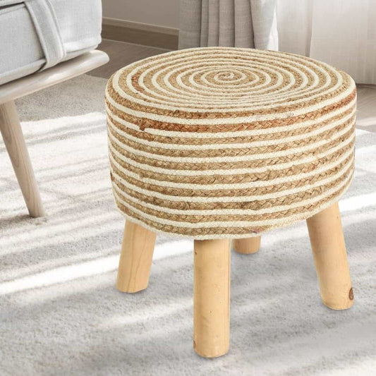 Placed on a carpet, White Circle of Life Stool, a white ottoman made from jute, cotton and mango wood, available at Sukham Home, a sustainable furniture, kitchen & dining and home decor store in Kolkata, India