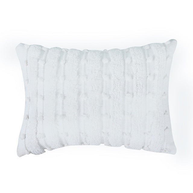 Against a white background, the White Tufted Lumbar Cushion, a rectangle ivory accent pillow available at Sukham Home, a sustainable furniture, kitchen & dining and home decor store in Kolkata, India