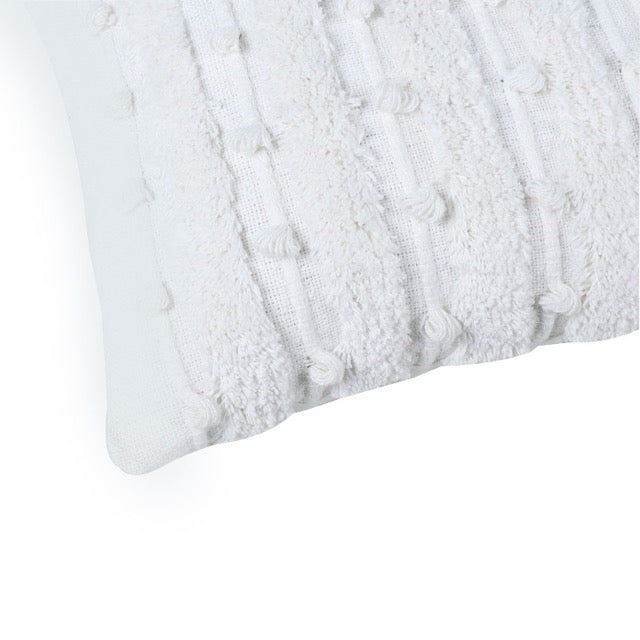 Close up of the tufting pattern of the White Tufted Lumbar Cushion, a rectangle ivory accent pillow available at Sukham Home, a sustainable furniture, kitchen & dining and home decor store in Kolkata, India