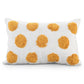 Against a white background, the White Lumbar Cushion with Tufted Yellow Circles, a rectangle ivory and mustard polka-dot accent pillow available at Sukham Home, a sustainable furniture, kitchen & dining and home decor store in Kolkata, India