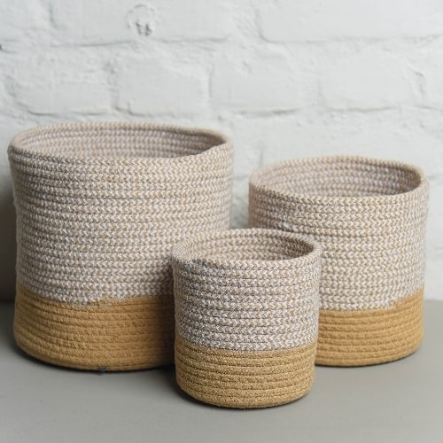 All 3 pieces of the Ivory Basket Set, a set of 3 white jute & cotton baskets you can buy online at Sukham Home, a sustainable furniture, kitchen & dining and home decor store in Kolkata, India