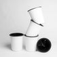 Stack of Oslo, a round white, self watering indoor planter made from plastic that you can buy online at Sukham Home, a sustainable furniture, gardening and home decor store in Kolkata, India