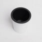 Top view of the Oslo, a round white, self watering indoor planter made from plastic that you can buy online at Sukham Home, a sustainable furniture, gardening and home decor store in Kolkata, India