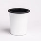 Side view of the Oslo, a round white, self watering indoor planter made from plastic that you can buy online at Sukham Home, a sustainable furniture, gardening and home decor store in Kolkata, India