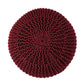 Against a white background, top view of the Wine Knitted Pouf, a red magenta ottoman made from cotton, available at Sukham Home, a sustainable furniture, kitchen & dining and home decor store in Kolkata, India