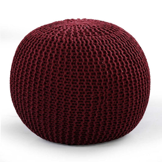 Against a white background, the Wine Knitted Pouf, a red magenta ottoman made from cotton, available at Sukham Home, a sustainable furniture, kitchen & dining and home decor store in Kolkata, India