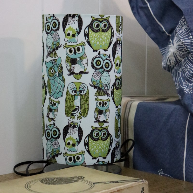 Close up of the variety of the owls on Wise Owl, a cloth canvas table lamp with many quirky owl designs you can buy online at Sukham Home, a sustainable furniture, kitchen & dining and home decor store in Kolkata, India