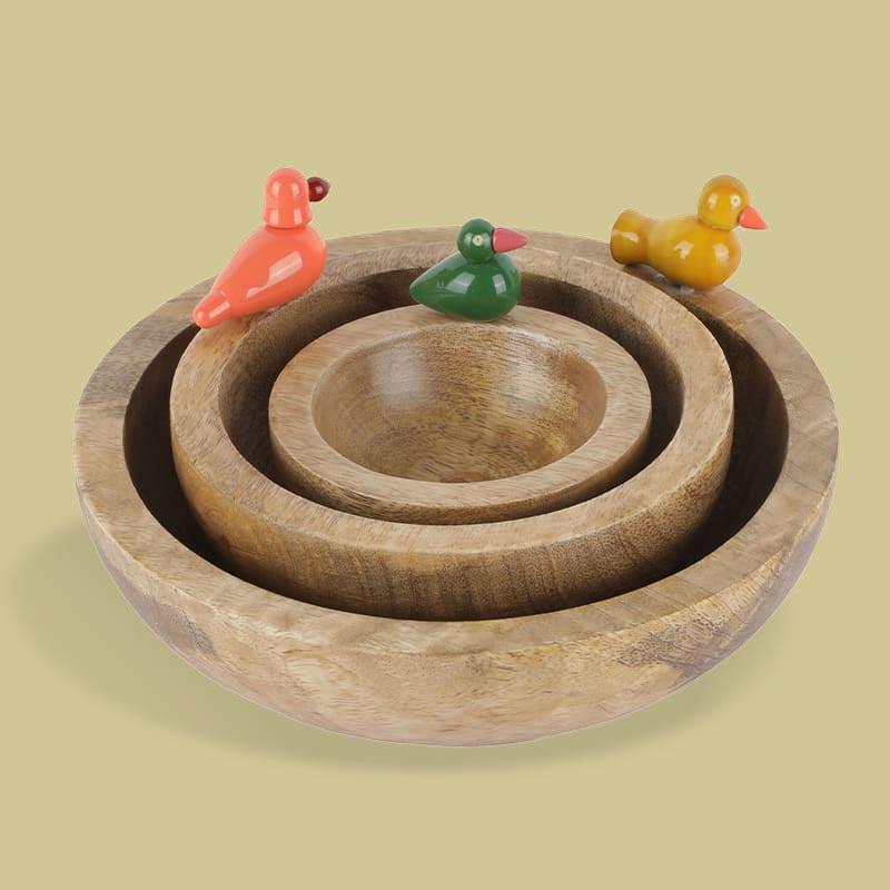 All the 2 bowls stacked from the Birds in Paradise Wooden Bowls, a set of 3 solid wood bowls with sculptures you can buy online at Sukham Home, a sustainable furniture, kitchen & dining and home decor store in Kolkata, India