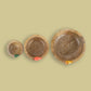 Top view of the Birds in Paradise Wooden Bowls, a set of 3 solid wood bowls with sculptures you can buy online at Sukham Home, a sustainable furniture, kitchen & dining and home decor store in Kolkata, India