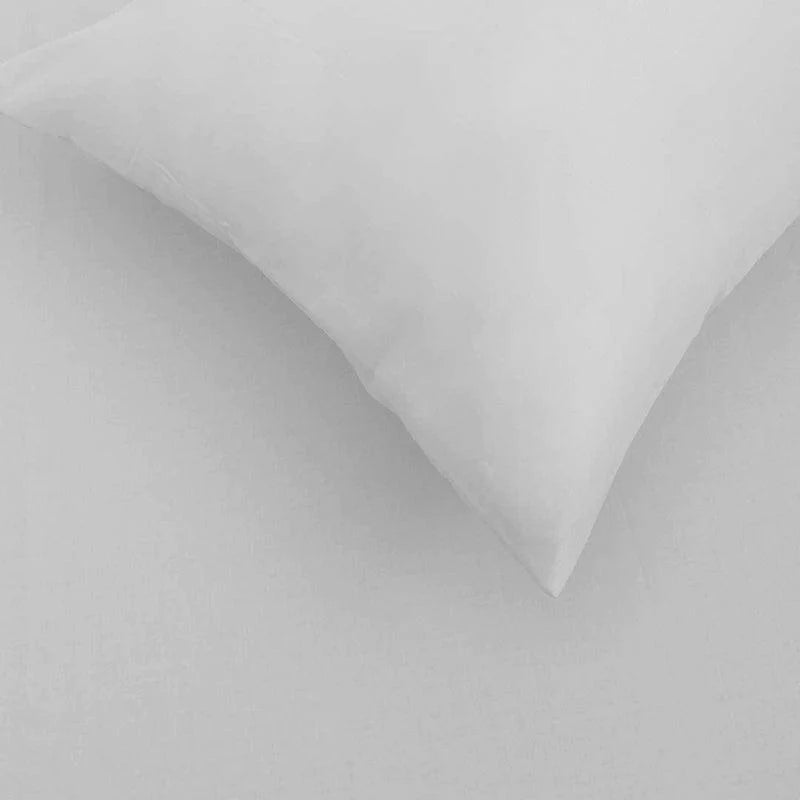 Close up of the fabric and texture of the White Classic Solid Bedsheet, a king size and queen size cotton bedsheet you can buy online at Sukham Home, a sustainable furniture, gardening and home decor store in Kolkata, India