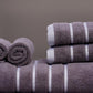 Close up of the design on the Grey Oh-So-Soft, a set of 6 purple towels, you can buy online at Sukham Home, a sustainable furniture, kitchen & dining and home decor store in Kolkata, India