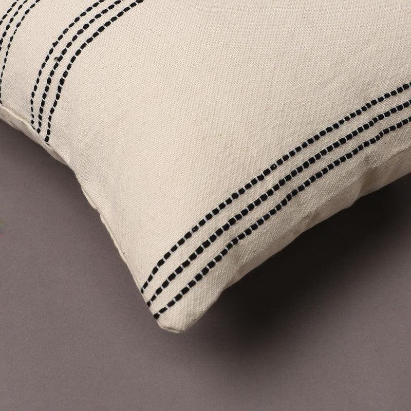 Close up of the woven design on the Linear Beige Cushion, a linen black and white geometric printed accent pillow you can buy online at Sukham Home, a sustainable furniture, kitchen & dining and home decor store in Kolkata, India