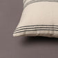 Corner of the Linear Beige Cushion, a linen black and white geometric printed accent pillow you can buy online at Sukham Home, a sustainable furniture, kitchen & dining and home decor store in Kolkata, India