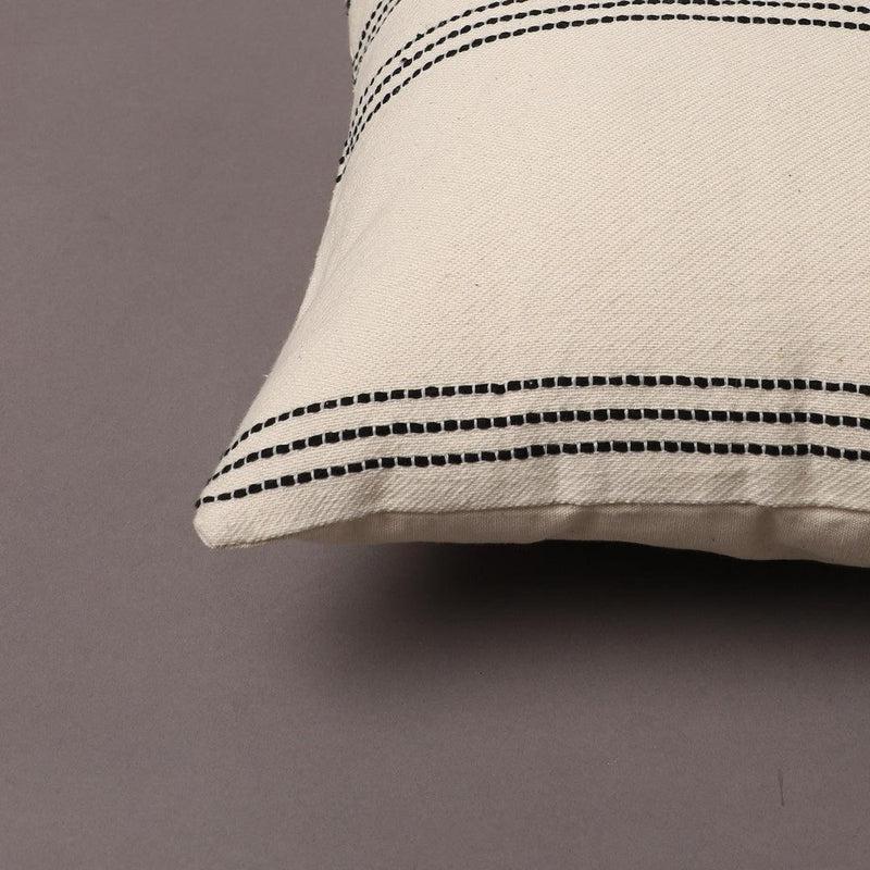 Corner of the Linear Beige Cushion, a linen black and white geometric printed accent pillow you can buy online at Sukham Home, a sustainable furniture, kitchen & dining and home decor store in Kolkata, India