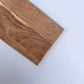 The board part of the Tokyo Acacia Wooden Platter, a solid wood cheeseboard you can buy online at Sukham Home, a sustainable furniture, kitchen & dining and home decor store in Kolkata, India