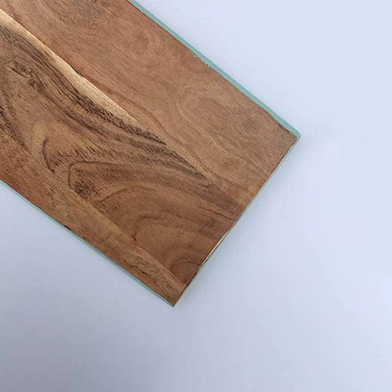 The board part of the Tokyo Acacia Wooden Platter, a solid wood cheeseboard you can buy online at Sukham Home, a sustainable furniture, kitchen & dining and home decor store in Kolkata, India